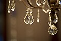 Leaf-shaped pendeloque prisms on a chandelier.