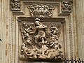 Porta dels fidels, en image de Sant Miquel per Julián Roldán
